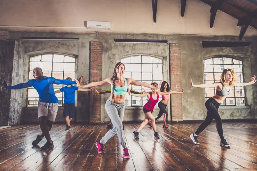 Choreographer teaching a dance in studio