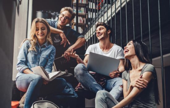 Students hanging out in the library at a film school
