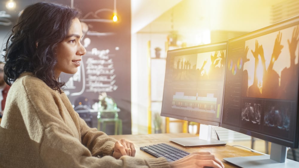 Film Editor editing a video on her computer