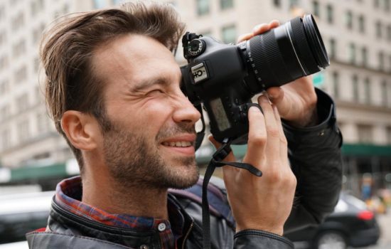 Man scouting locations for film production